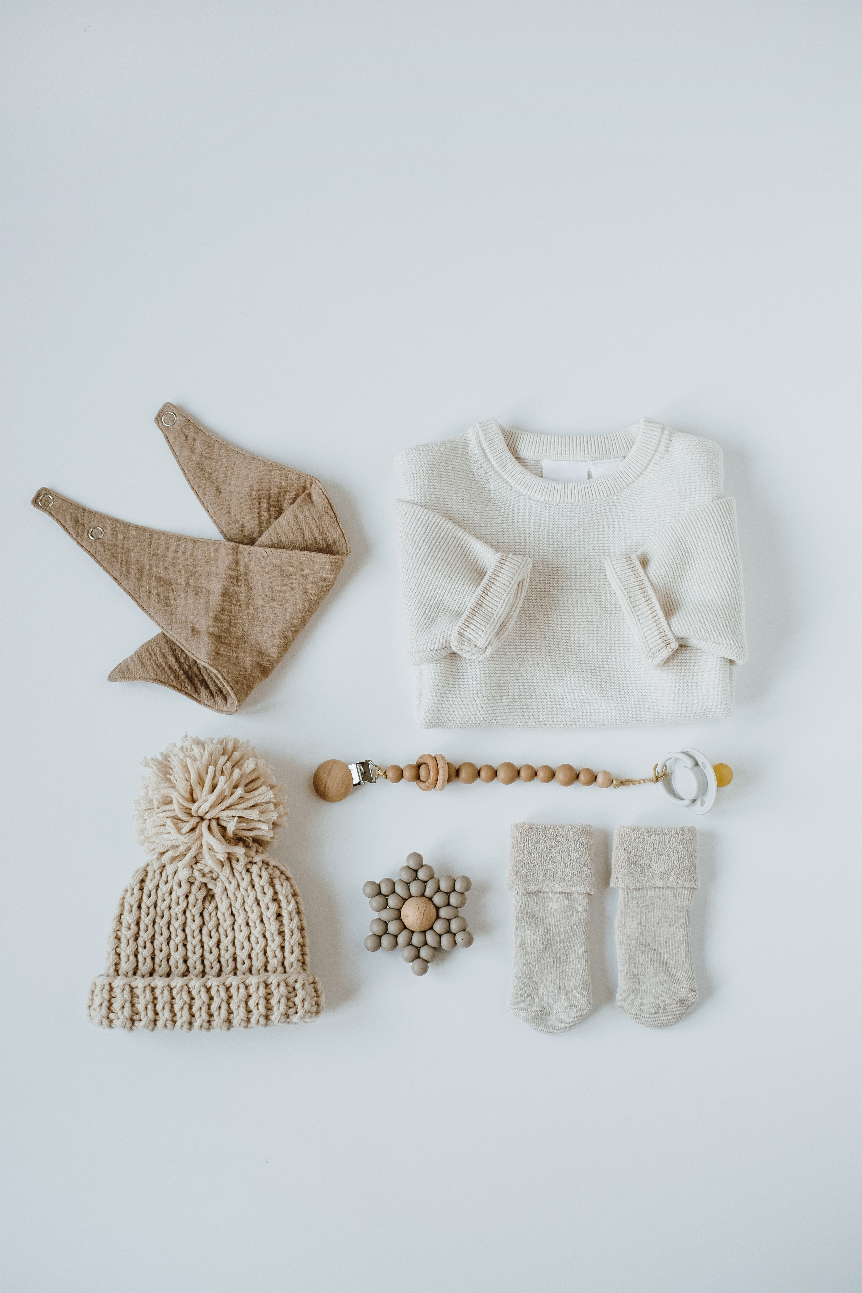 Nordic Baby Clothes and Accessories Flat Lay 